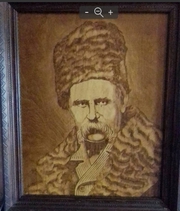 Портрет Т.Г. Шевченко выжженный на дереве. 